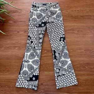 Italian Luxury Brand - Slim, Flare Leg Pant with Tall 32” Inseam. NWOT. Size 2